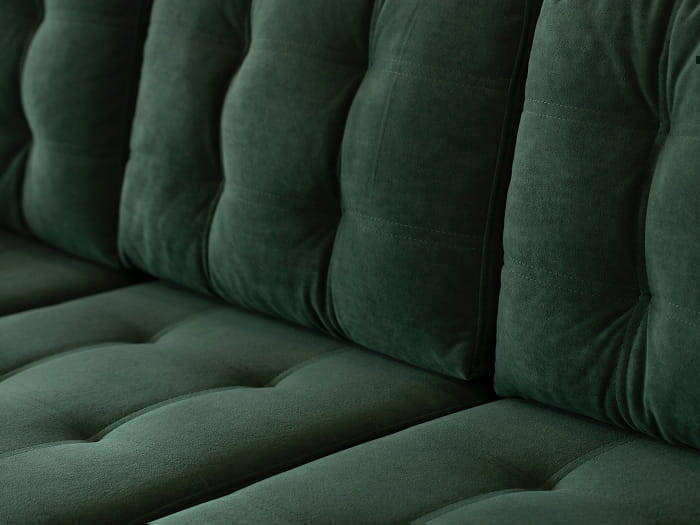 Blown-in sofa cushion filling process in our Barrie upholstery shop